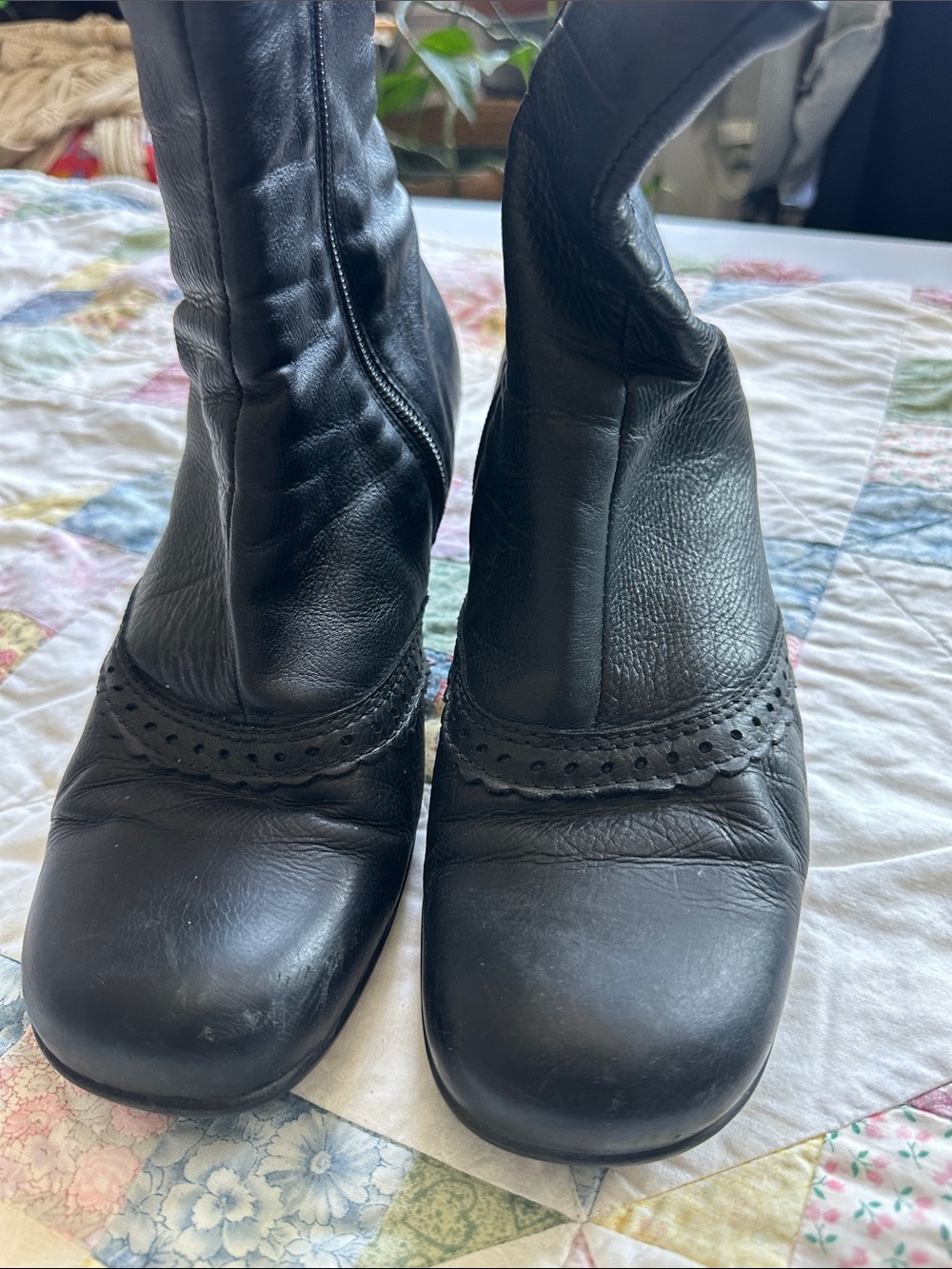 La CANADIENNE Black Leather Ankle Booties with Decorative Perforated.